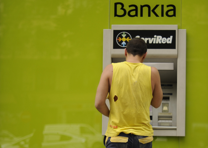 Las pérdidas de Bankia han destapado la crisis bancaria en el Estado español. (Pedro ARMESTRE / AFP)
