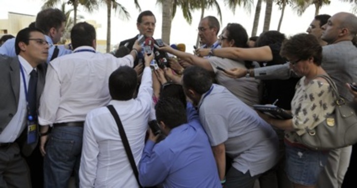 La llegada de Mariano Rajoy a Los Cabos ha levantado una gran expectación mediática. (Cris BOURONCLE/AFP) 