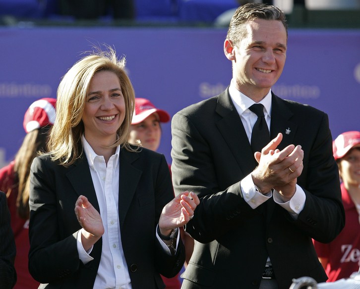Cristina de Borbón junto a su marido, Iñaki Urdangarín. (Josep LAGO / AFP)