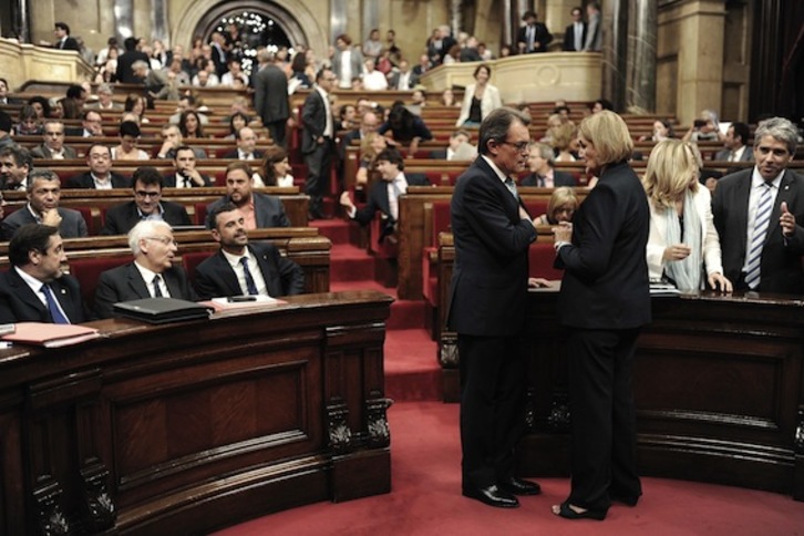 El president, Artur Mas, en el Parlament en una de las sesiones del debate de política general. (Josep LAGO/AFP)