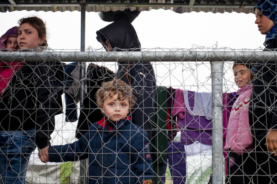 Cola para acceder a una ración de alimento de una ONG. (Juan TEIXEIRA) Cola para acceder a una ración de alimento de una ONG. (Juan TEIXEIRA)