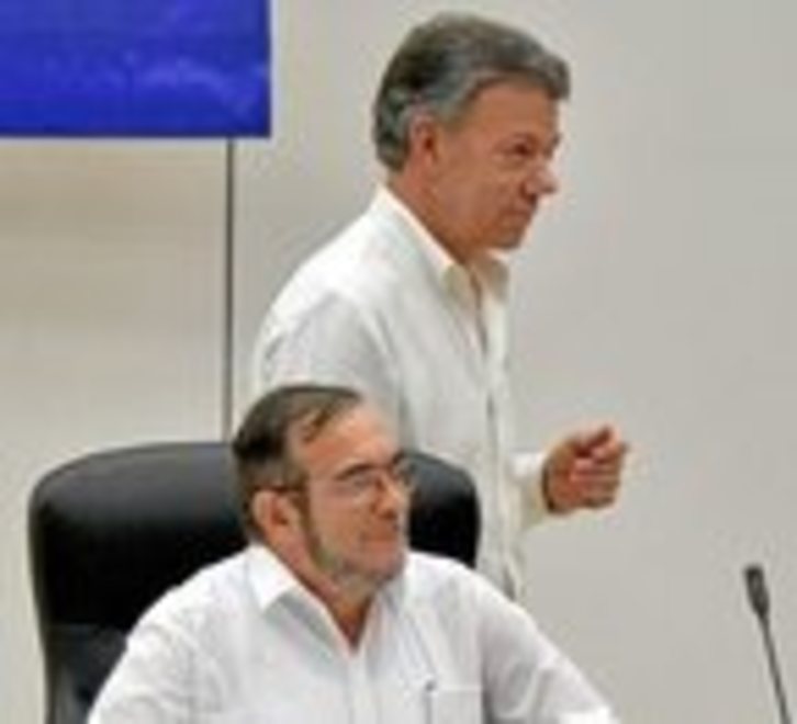 Santos durante el acto de presentación del acuerdo con las FARC. (AFP)