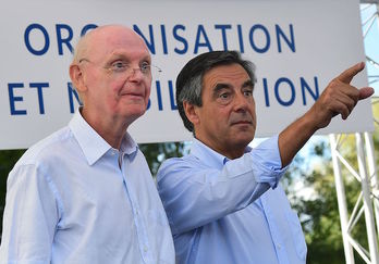 Patrick Stefanini y François Fillon, en una imagen de archivo. (JEAN-FRANCOIS MONIER / AFP)
