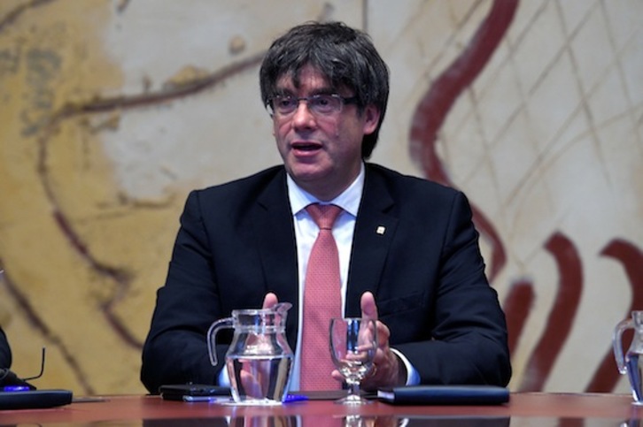 Carles Puigdemont, durante una reunión del Govern. (Lluis GENÉ/AFP)