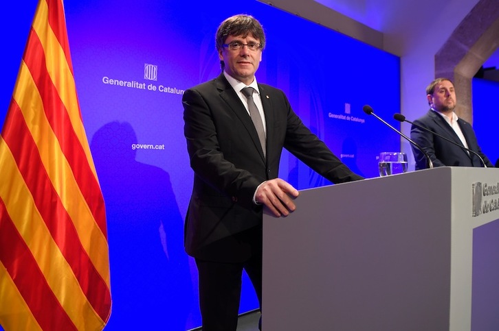 Carles Puigdemont, el pasado día 14 junto a Oriol Junqueras. (Lluis GENE/AFP)