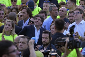 Puigdemont, en la manifestación de la Diada. (Lluís GENÉ/AFP PHOTO)