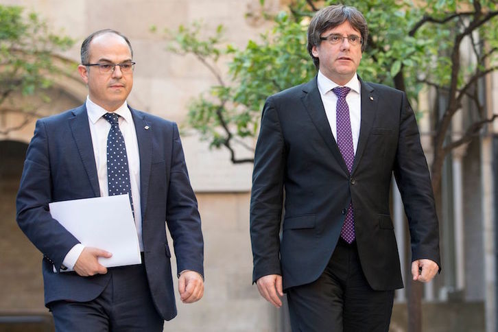 Turull y Puigdemont, en una imagen de archivo. (Pau BARRENA/AFP)