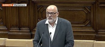 El presidente de JxSí, Lluís Corominas, en su comparecencia en el Parlament. (@JuntsPelSi)