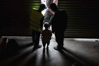 Tres migrantes hondureños en Tijuana. (Guillermo ARIAS/AFP)