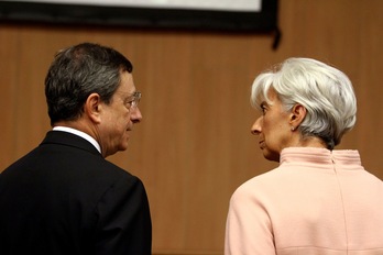 Mario Draghi y su sucesora al frente del BCE, Crhistine Lagarde. (Yiannis KOURTOGLOU | AFP)