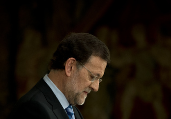 Acto simbólico contra el rescate de Bankia y las entidades financieras ante el Congreso de los diputados (Dani POZO/AFP)