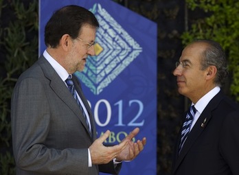 El presidente español, Mariano Rajoy, junto a Felipe Calderón, su homólogo en México, país anfitrión de la cumbre del G20. (Paul J. RICHARDS/AFP PHOTO) 