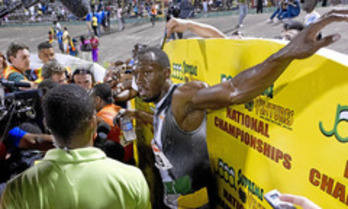 Bolt tras batir el récord del mundo. (AFP)