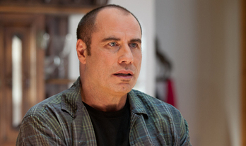 John Travolta, en un fotograma de la película ‘Salvajes’. (UNIVERSAL PICTURES)