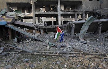 Imagen de un pueblo en Gaza tras la ofensiva israelí, que hoy entra en alto el fuego. (Mahmun HAMS/AFP)