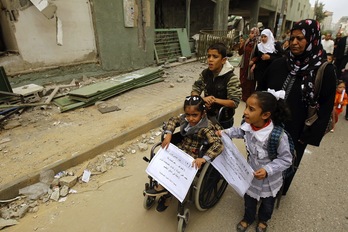 Palestinos en Gaza el día en el que la ONU reconoció su estatus de Estado Observador. (Mohammed ABED / AFP)