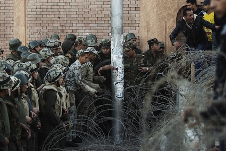 Imagen de los enfrentamientos entre manifestantes y la Policía. (Gianluigi GUERCIA/AFP)