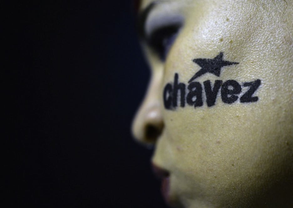 Una seguidora del FMLN salvadoreño, en una concentración tras la muerte de Chávez. (Marvin RECINOS/AFP PHOTO) Una seguidora del FMLN salvadoreño, en una concentración tras la muerte de Chávez. (Marvin RECINOS/AFP PHOTO)