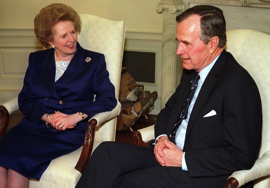 En 1991, con el expresidente de EEUU, George Bush. (Luke FRAZZA/AFP)