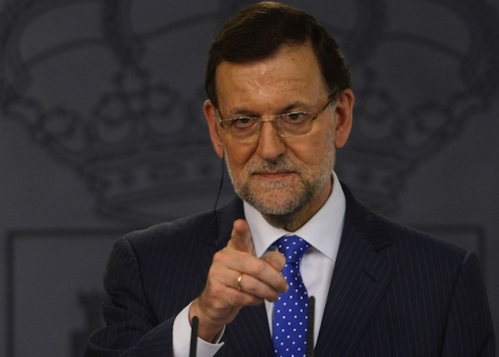 El presidente, Mariano Rajoy, en una de sus pocas ruedas de prensa. (Pierre-Philippe MARCOU/AFP)