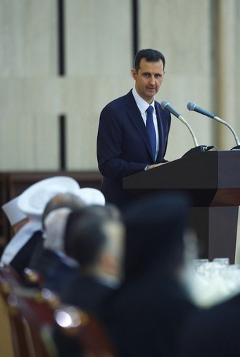 El presidente sirio, Bashar al-Assad, durante su alocución. (AFP PHOTO)
