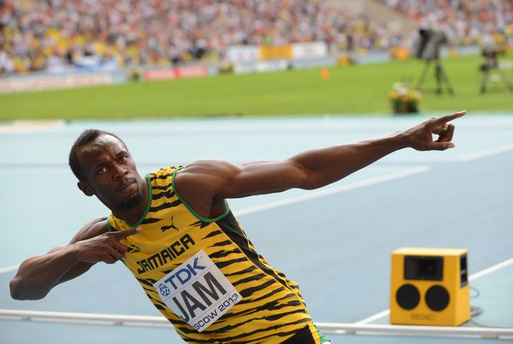 Bolt celebra el oro en 4x100. (Kyrill KUDRIATSEV / AFP)
