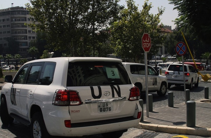El convoy de la ONU que investiga el supuesto ataque químico hoy en Damasco. (AFP)