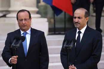 Hollande atzo Parisen, Ahmed Al-Jarba-rekin, Syrian National Coalition oposizioko presidentea. (Kenzo TRIBOUILLARD / AFP)