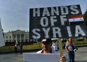 Protesta ante la Casa Blanca para rechazar una posible intervención militar contra Siria. (Jewel SAMAD/AFP PHOTO)