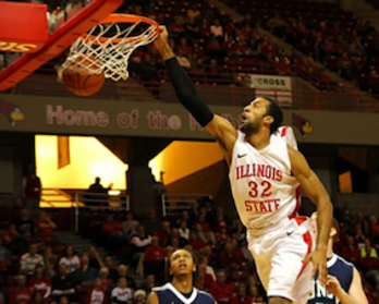 Carmichael se cuelga del aro en un partido universitario. (BILBAO BASKET)