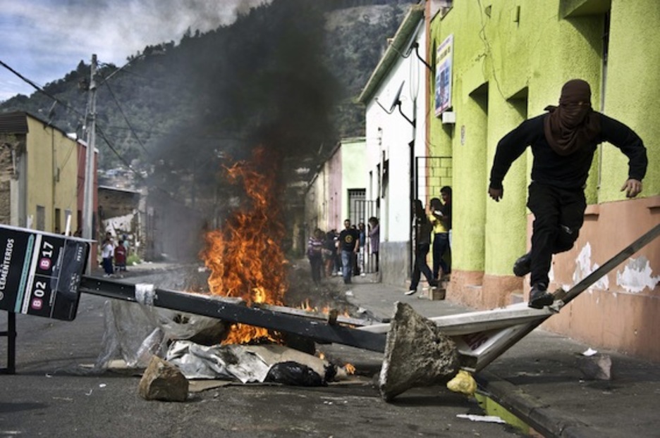 En las manifestaciones para conmemorar el golpe de Estado se han producido algunos incidentes. (Martin BERNETTI/AFP PHOTO) En las manifestaciones para conmemorar el golpe de Estado se han producido algunos incidentes. (Martin BERNETTI/AFP PHOTO)