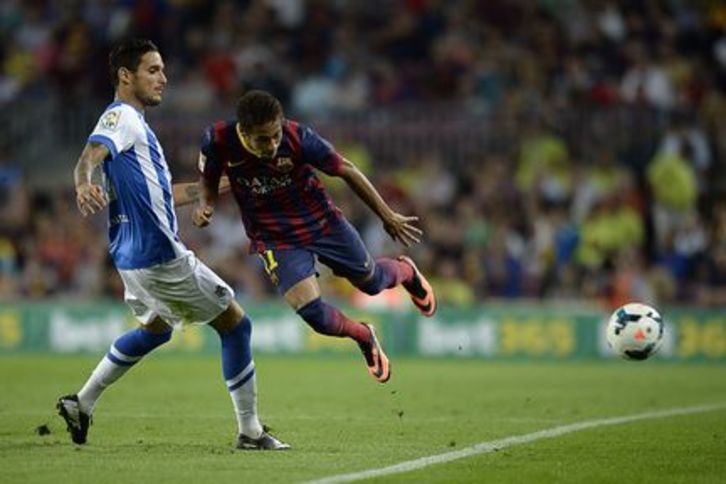 Pasa den irailean jokatu zuten azkenezkoz Realak eta Bartzelonak elkarren aurka, Ligan. (Lluis GENE/AFP)