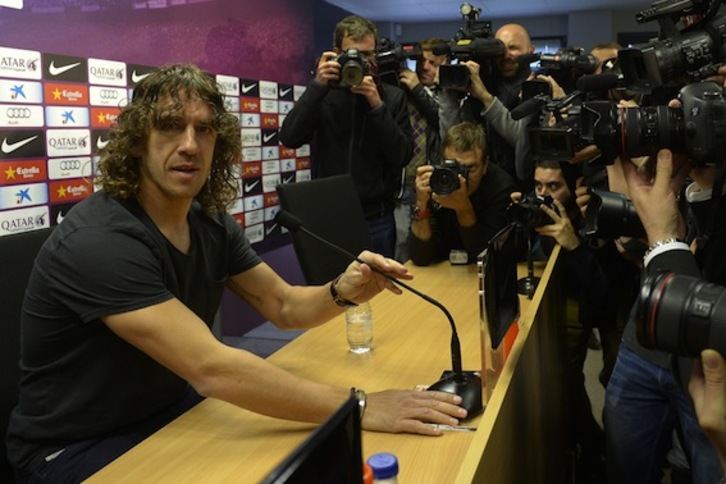Carles Puyol, en su comparecencia ante la prensa. (Lluis GENÉ/AFP PHOTO)