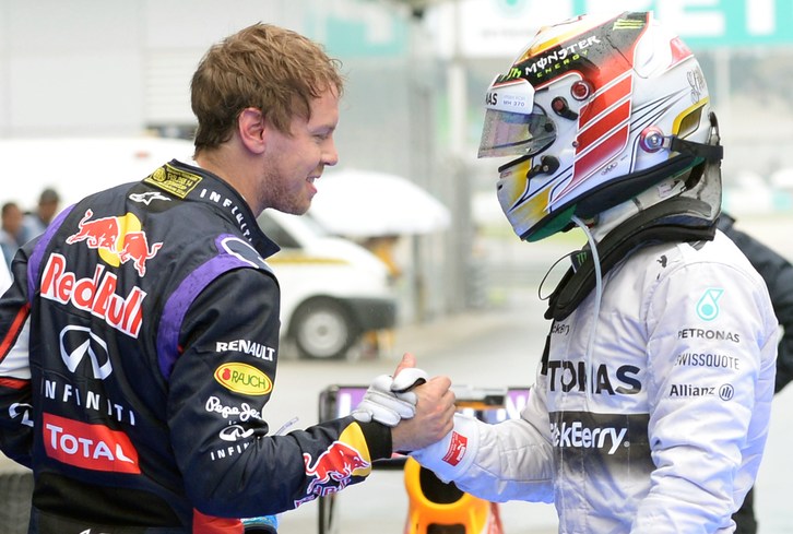 Hamilton y Vettel en Sepang. (AFP)