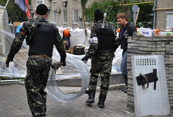 Milicianos prorrusos, en las calles de Donetsk. (Genya SAVILOV/AFP PHOTO)
