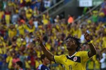 El colombiano Juan Guillermo Cuadrado celebra su gol. (Luis ACOSTA/AFP PHOTO)