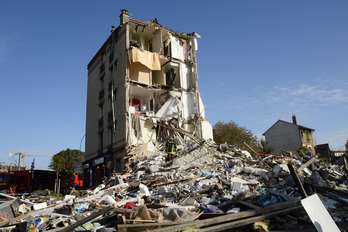 El edificio ha quedado reducido tras la explosión. (Bertrand GUAY / AFP)