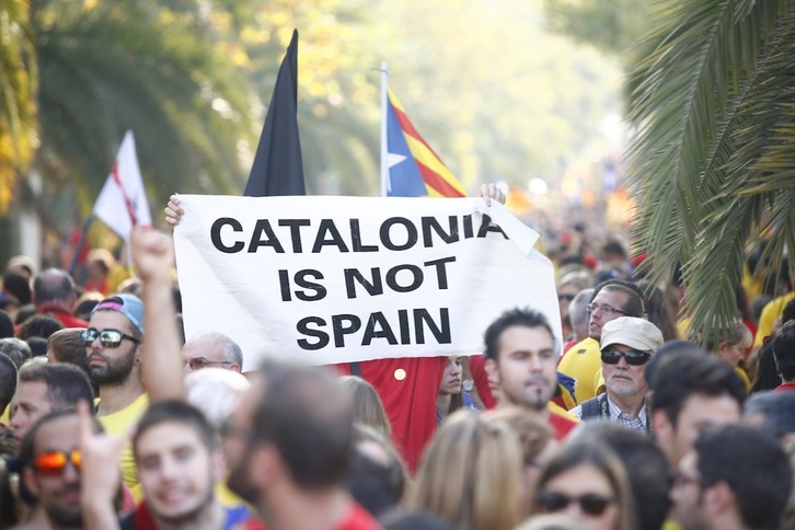 Un participante porta un cartel reivindicativo. (ASSEMBLEA CATALANA)