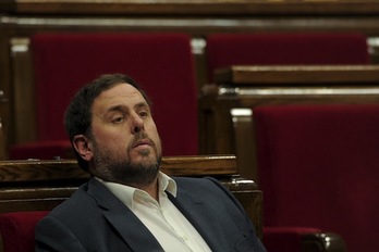 El presidente de ERC, Oriol Junqueras, esta mañana en el Parlament. (Josep LAGO/AFP)