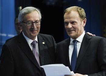 El presidente de la Comisión, Jean-Claude Kuncker, y el del Consejo, Donald Tusk. (John THYS / AFP)  