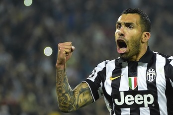 Óscar Tévez celebra su tanto. (Olivier MORIN/AFP PHOTO)