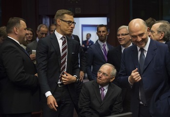 Miembros del Eurogrupo, antes de comenzar la reunión. (John THYS / AFP)