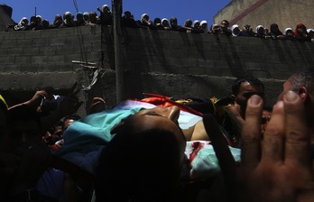 El cuerpo de Mohammed Alawneh durante su funeral. (Jaafar ASHTIYEH/AFP)
