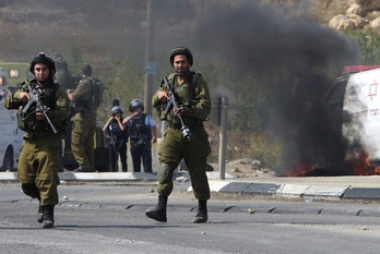 Soldados israelíes en Hebrón. (Hazem BADER / AFP)