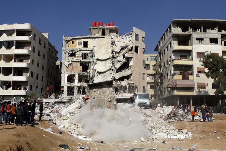 El edificio atacado por Israel. (Louai BESHARA / AFP)