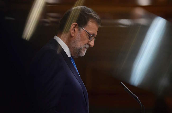 Rajoy durante su discurso de investidura. ( PIERRE-PHILIPPE MARCOU | AFP)