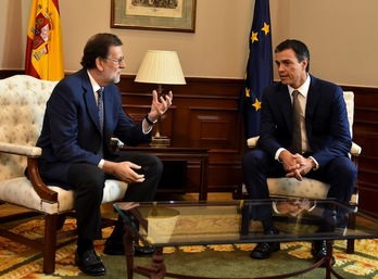 Mariano Rajoy y Pedro Sánchez, en su encuentro del 29 de agosto. (Gerard JULIEN/AFP)