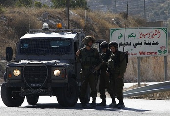 Miembros de las fuerzas israelíes desplegados cerca de Hebrón. (Hazem BADER/AFP)