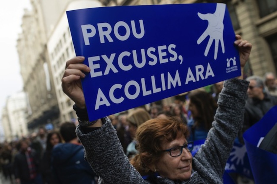 «¡Basta de excusas, acojamos ahora!», ha sido uno de los principales lemas. (Josep LAGO/AFP)