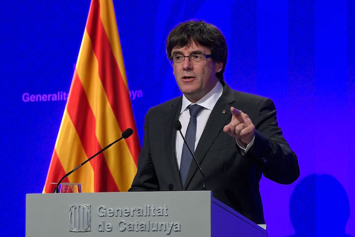 Puigdemont, en la comparecencia tras la reunión del Consell Executiu de ayer. (Lluis GENE/AFP)